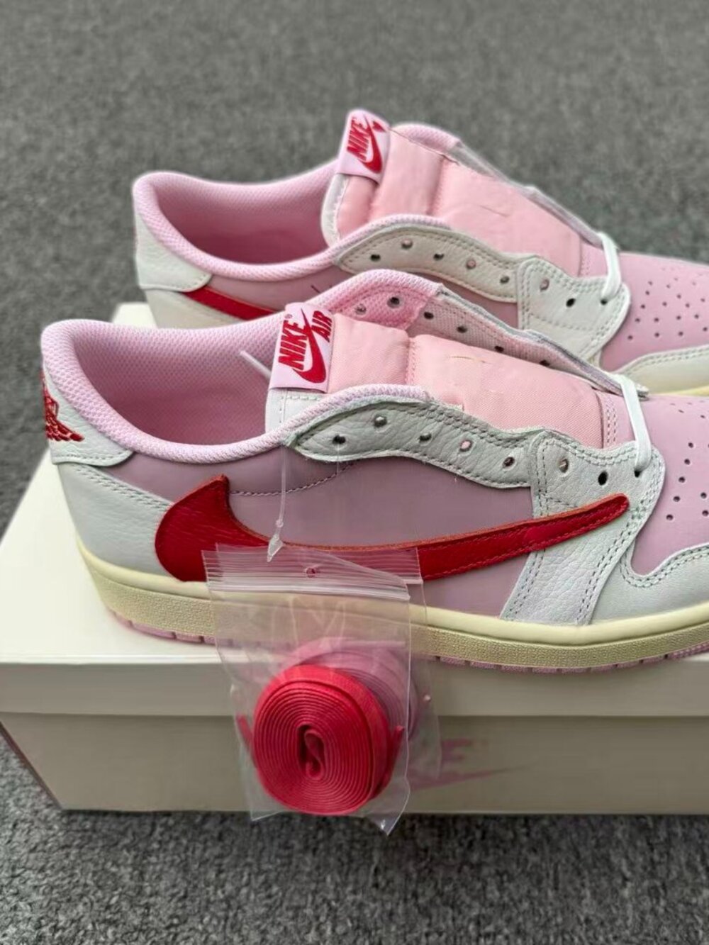 Jordan × Travis Scott Air Jordan 1 Low OG Shy Pink Reverse Swoosh Collaboration: